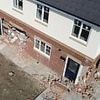 JCB rampage leaves newbuild estate in ruins after 'teen yob' smashes through SEVEN homes