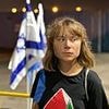 Greta Thunberg and 'freedom flotilla' activists 'REFUSED to watch footage of October 7 atrocities' ahead of their deportation - as the glum-looking Swede is pictured being kicked out of Israel