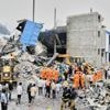 At least 12 killed in an explosion and fire at a pharmaceutical factory in southern India