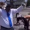 Chaos in Detroit as dead man's life savings are dropped from HELICOPTER to honor his final wish