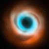 Watch the birth of a new PLANET: Incredible images show a distant world sculpting spirals of dust around it