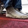 Etiquette expert reveals when it is acceptable to take off your shoes on a plane