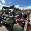 At least 12 dead in Indonesia bus crash after brakes apparently failed, police say