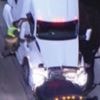 Moment suspects carjack a tanker lorry during police pursuit in LA