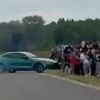 Horrifying moment car crashes into crowd of spectators at Polish drag racing event - leaving at least 17 injured