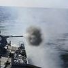 Putin stages major war games on NATO's doorstep as submarine fires torpedoes at mock Western ship and Russia vows to conduct 'dozens' more naval drills this summer