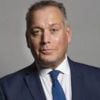 Scandal-hit ex-MP dies suddenly in London flat at 59