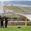 Man and woman 'jumped' 200ft to their deaths from cliff in front of horrified onlookers at seaside beauty spot