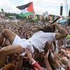 Israel blasts BBC for failing to cut hour-long live broadcast of punk band's vile outburst - as police face demands to arrest Bob Vylan singer who led 'death to Israeli soldiers' chants at Glastonbury