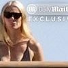 Gwyneth Paltrow debuts 'IDGAF' figure on yacht vacation with surprising 90s legends... as insiders reveal huge lifestyle shift