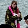Raising her glass to a war on the middle classes? 'Woman of the people' Angela Rayner is snapped sipping rosé on the beach in £165 Dryrobe