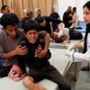 Israeli forces kill 51 Palestinians waiting for flour at Gaza aid site, witnesses and rescuers say
