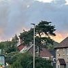 Holidaymakers are evacuated and roads are closed as blaze rips through moorland - with smoke seen for miles