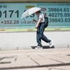 Asian markets mixed and Japan's shares slip after election leaves PM future in doubt