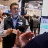 World shares are mixed in quiet trading as traders await cues from the Fed