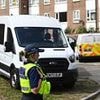 Murder probe launched and man arrested after woman in her 30s is found dead in quiet street