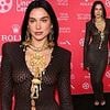 Dua Lipa looks sensational in a sheer black mesh dress as she poses up a storm at the 50th Chaplin Award Gala in New York