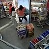 Instant karma! Book store thief who threatened to shoot female customer is battered by four women when they realise his gun is a fake