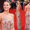 Bold and Beautiful! Margot Robbie looks incredible in breathtaking sheer gown with a daring open back for London premiere of new movie with Colin Farrell