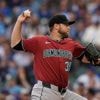 Kelly homers twice, Tucker hits go ahead shot as Cubs outslug Diamondbacks 13-11