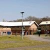 UK's first secure school for youngsters in custody is forced to close after weapon-making child inmates 'kicked down every internal door' and had 'free rein on building'