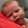 Baby makes shock arrival in football club toilet