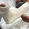 I was on the Ryanair flight that was evacuated in Majorca and jumped 18ft from the plane's wing... I now have to have three surgeries and am stuck in a foreign hospital - the 'airline is trying to play down what happened'