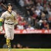 Kikuchi carries shutout into 8th and Angels beat A's 7-4 despite Clarke's amazing catch