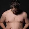 Couch potato turns into body-builder in one year with punishing gym regime... it's not just his body that's transformed