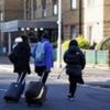 UK's asylum hotel bill down 30%, government says