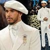 Met Gala 2025: Lewis Hamilton cuts a dapper figure in an eye-catching white suit and beret as he hits the blue carpet at fashion's biggest night