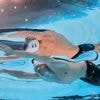 Léon Marchand tries to break his own 200 IM world record at the swim worlds in Singapore