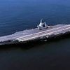 China accuses UK of 'trouble-making and provocation' as Royal Navy warship passes through Taiwan Strait with Beijing's newest aircraft carrier in the area