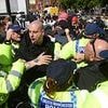 Police clash with protesters as hundreds of far-right supporters and counter-demonstrators confront each other