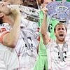Harry Kane lifts a trophy! England captain FINALLY gets his hands on first silverware of his career with Bayern Munich after Bundesliga glory