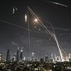 Iranian ballistic missiles rain down on Tel Aviv with skies ablaze after Iran vowed 'revenge' on Israel for nuclear site attacks