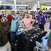 'My wife and kids face a sleepless night on an airport floor': Stranded Brits tell of chaos after ALL flights leaving the UK were grounded - as mystery remains over cause of 'glitch'