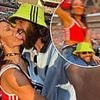 Lou Teasdale and Andy Carroll maintain their united front after 'Greek bust up' with another steamy public display of affection at Oasis gig - as Geordie striker admits it's 'not the first time I've scored at Wembley'
