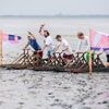Deutsche Meister gekürt: Titelverteidiger triumphieren beim Schlickrutschen in Dangast