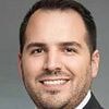 Hospital director who filmed staff and patients on hidden bathroom camera accidentally filmed himself installing it, police say