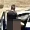 Police officers are suspended after they're filmed having SEX in patrol car in broad daylight