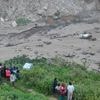 Monsoon floods sweep away 18 people and the main bridge linking Nepal to China