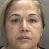 'Loving mother' who used her children to smuggle £14.4m of cocaine into UK with luggage trick is jailed for 13 years