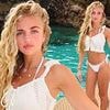Princess Andre, 18, stuns in a white bikini on a yacht in Ibiza as mum Katie brands her 'my little stunner' after Peter's bombshell claims about ex-wife's 'baseless lies'