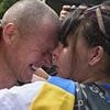 Moment Ukrainian soldier kisses his wife after being freed during Russia and Ukraine's swap of over 300 more prisoners