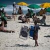 Rio’s mayor eases his new rules on live beach music after an outcry