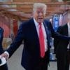 Watch: Trump jokes he wants Powell to lower interest rates in awkward exchange