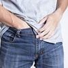 Scientist reveals the surprising reason why so many young men put their hands down their trousers