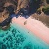 Tragedy as British woman, 24, dies after suffering a seizure while snorkelling off famous Indonesian beach
