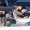 Victoria Beckham straddles shirtless husband David before he cools off in the shower as besotted pair share very steamy moment on their £16M yacht